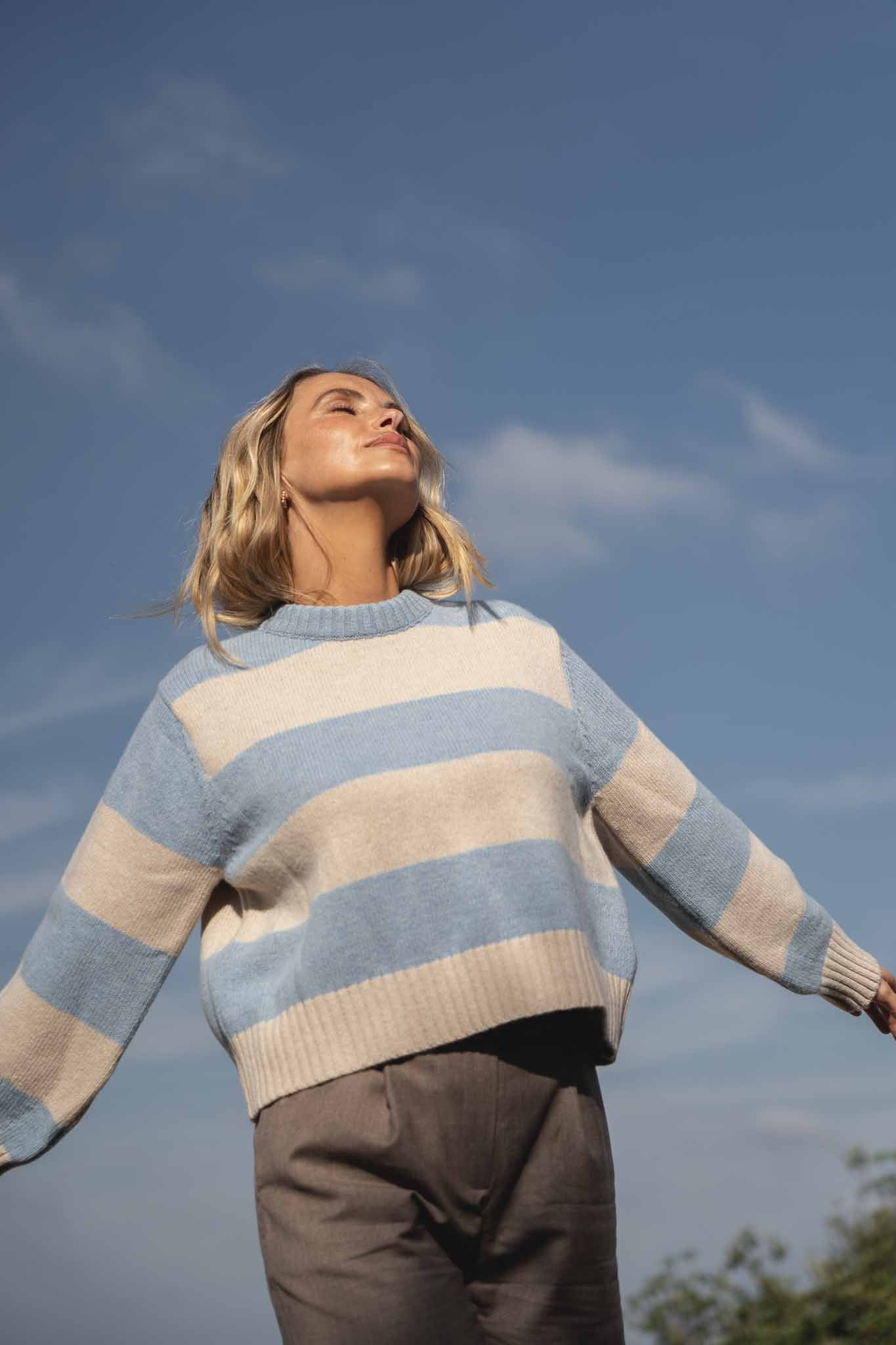 Girl using sustainable wool sweater