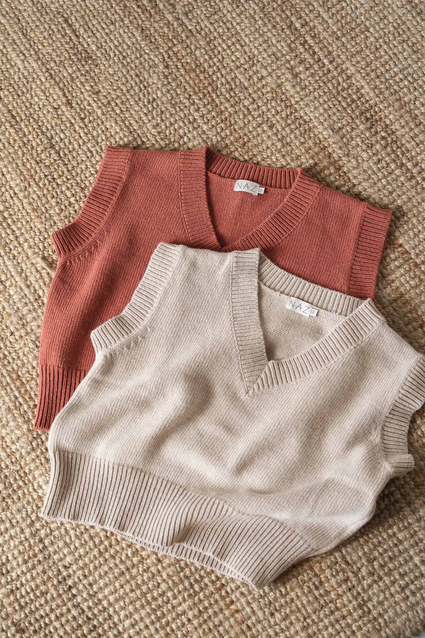 NAZ Alice Knit Vests in Brick and Beige. Made with 100% Recycled Wool.