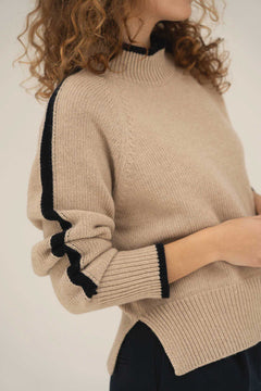 NAZ Agnes Sweater in Beige. Featuring a Navy color block detail. Made with 100% Recycled Wool.