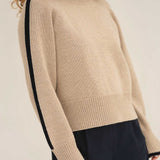 NAZ Agnes Sweater in Beige. Featuring a Navy color block detail. Made with 100% Recycled Wool.