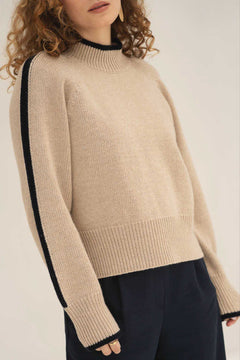 NAZ Agnes Sweater in Beige. Featuring a Navy color block detail. Made with 100% Recycled Wool.